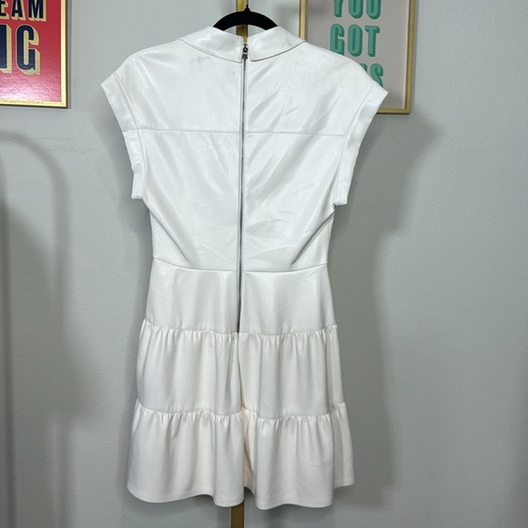 Alice and Olivia
Mila Faux Leather Twist Front Cap Sleeve Dress - Picture 10 of 10